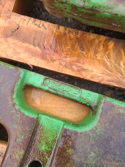 (4) John Deere Front Suitcase Weights