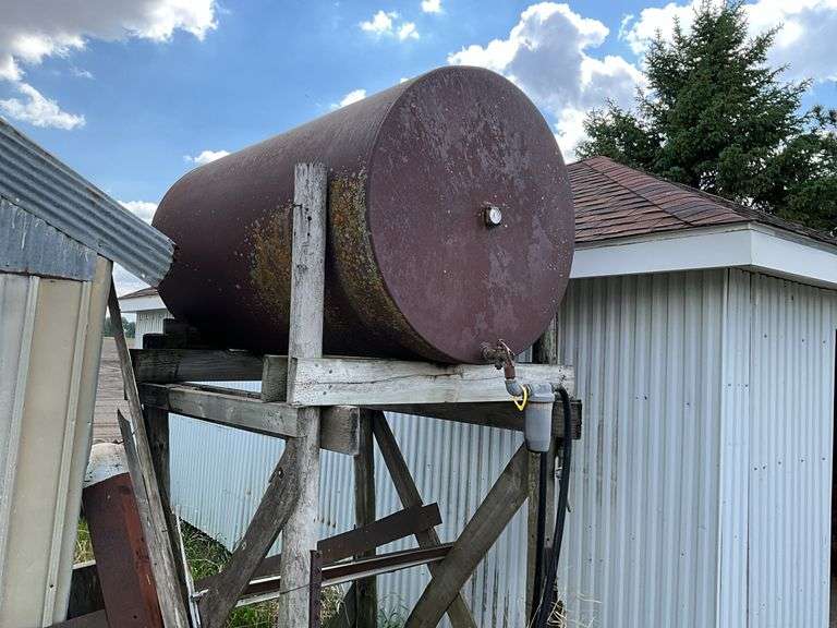 Fuel barrel on wood stand