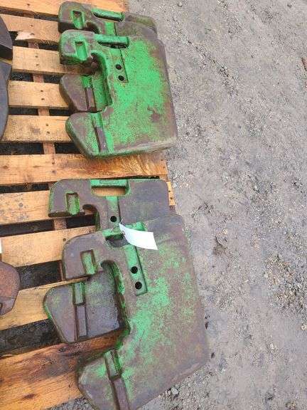 (4) John Deere Front Suitcase Weights