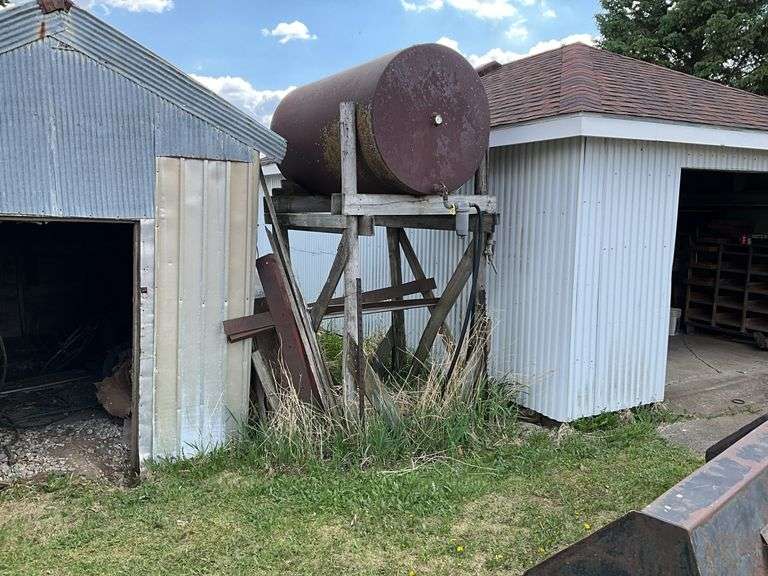 Fuel barrel on wood stand