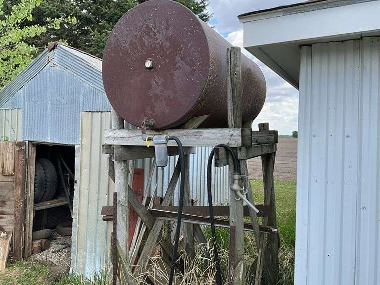 Fuel barrel on wood stand