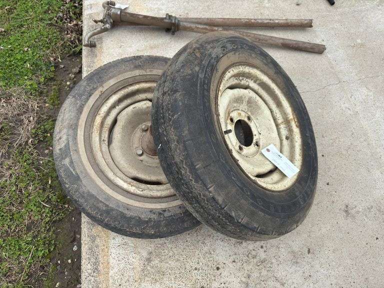 (2) 4 Bolt Rims with 14" tires