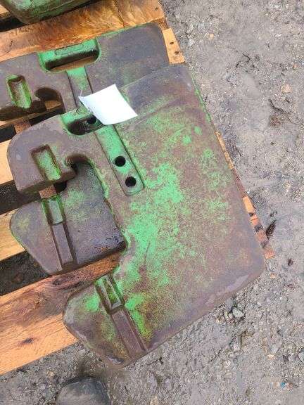 (4) John Deere Front Suitcase Weights
