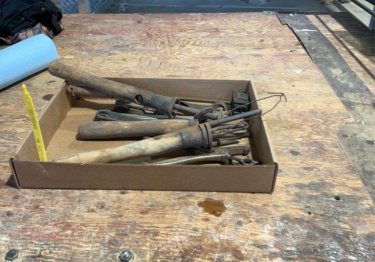 Cross cut saw handles & leather punches & vintage 