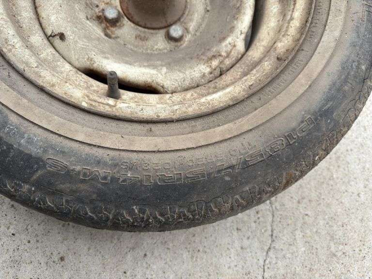 (2) 4 Bolt Rims with 14" tires