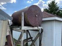Fuel barrel on wood stand