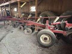 International 710 Automatic Plow, 5 x 18's, Coulters, In-Furrow