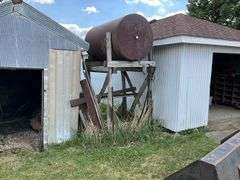 Fuel barrel on wood stand