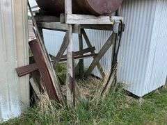 Fuel barrel on wood stand
