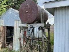 Fuel barrel on wood stand