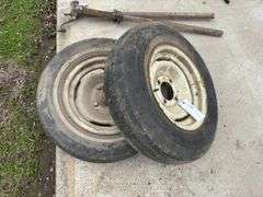 (2) 4 Bolt Rims with 14" tires