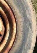(1) 9.5L-15 tire on 6 bolt rim