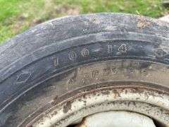 (2) 4 Bolt Rims with 14" tires