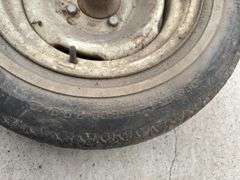 (2) 4 Bolt Rims with 14" tires