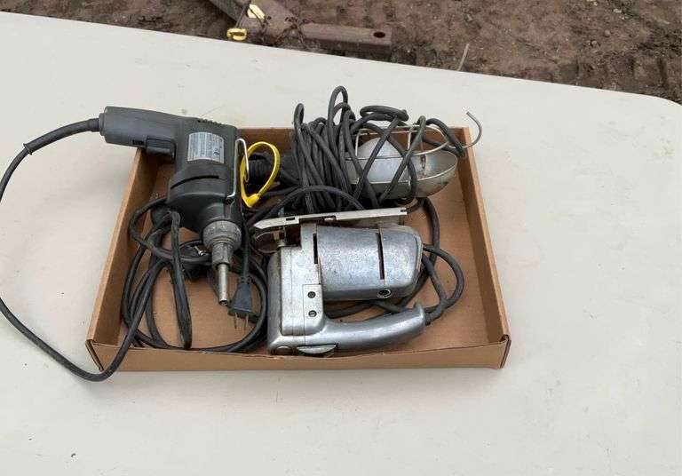 Flat of jig saw, work light, & driver