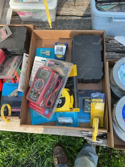 Flat of multi-meter, craftsman bit set, tape measure, misc connectors