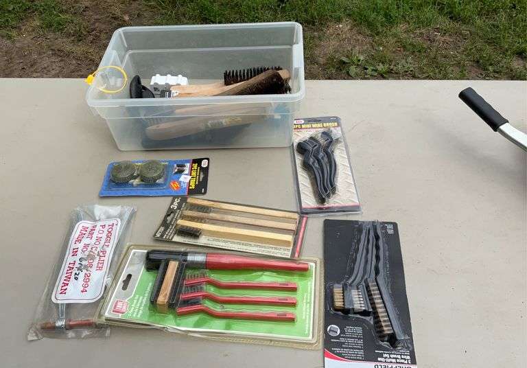 Tote of wire brushes, toggle pliers