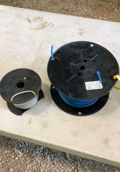 2 spools of telephone wire;