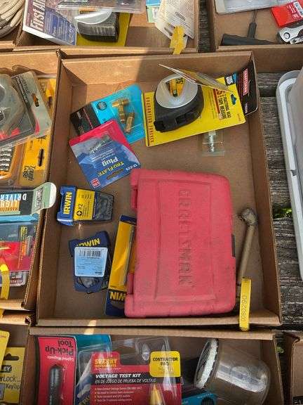 flat w/multi meter, craftsman bit set, magnetic pick up tool, misc connecto