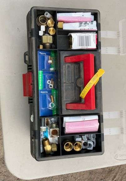 Tool box w/misc plumbing supplies