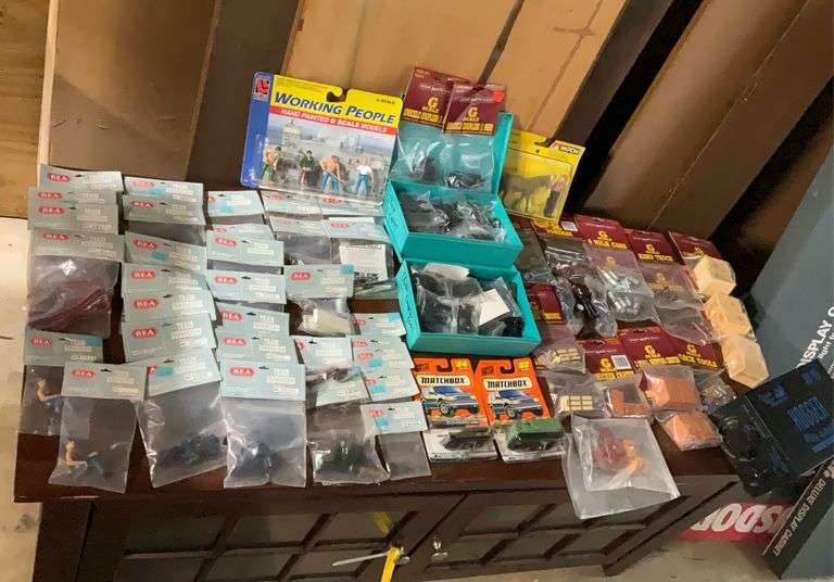 2 boxes of train related accessories