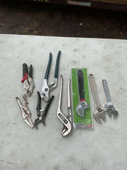 Flat of channel locks, adjustable wrenches & vice grips
