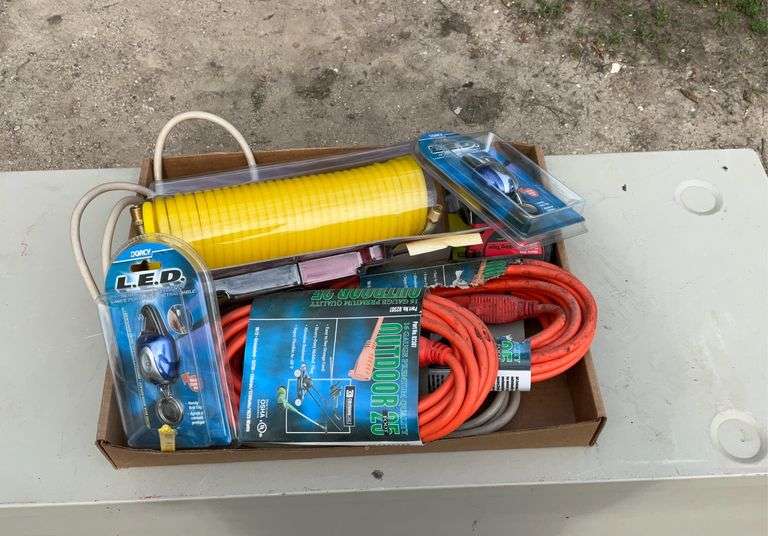 Flat of extension cords, air hose, hex keys, tape measure