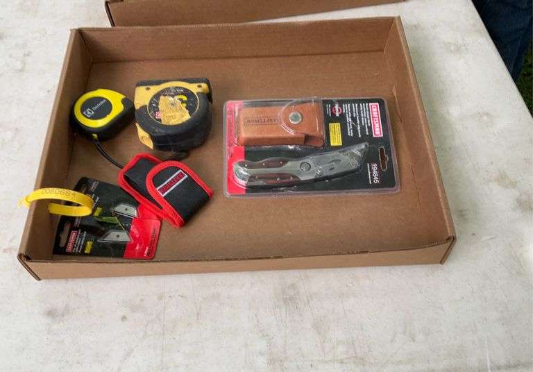 Flat of tape measures, razor blade knives
