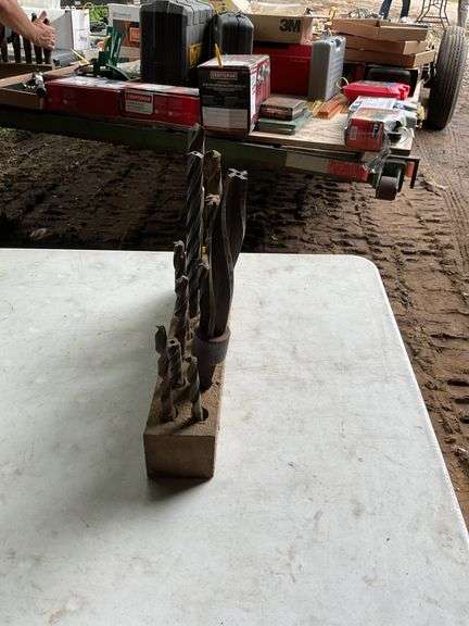 2 blocks with oversized drill bits