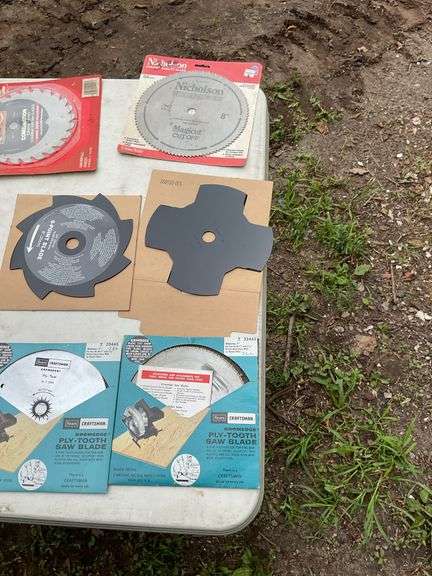 Flat of new & used saw blades