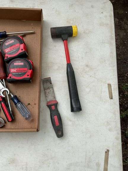 flat with evolv 10pc 1/4" drive socket set, tape measures, screw drivers, p