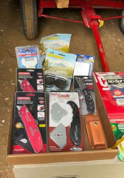 2 flats of flags, toolbox liner, tool bag, utility knives and misc.