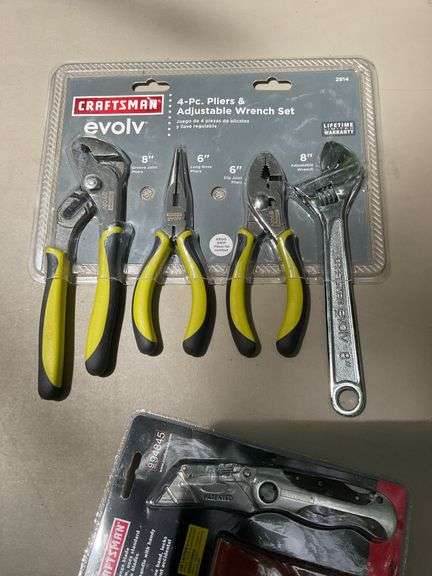 Flat of craftsman ratchets, utility knife, pliers