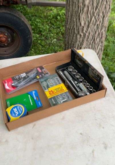 3/8, 1/4 socket set, utility knife, tape measure