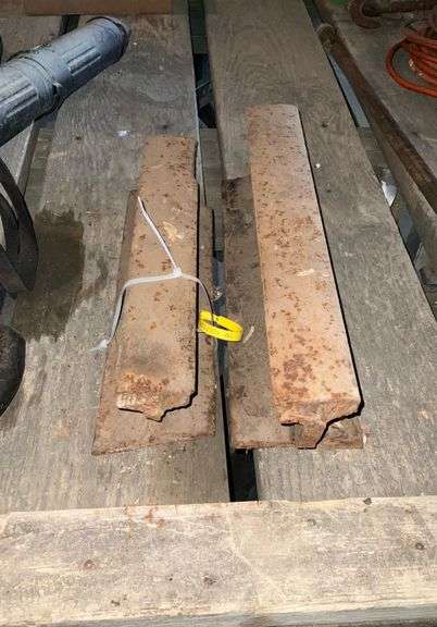 (2) chunks of Railroad iron