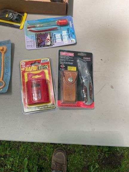 Flat of chalk line, utility knives, thread taps, misc