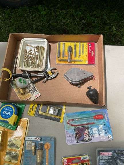 Flat of chalk line, utility knives, thread taps, misc