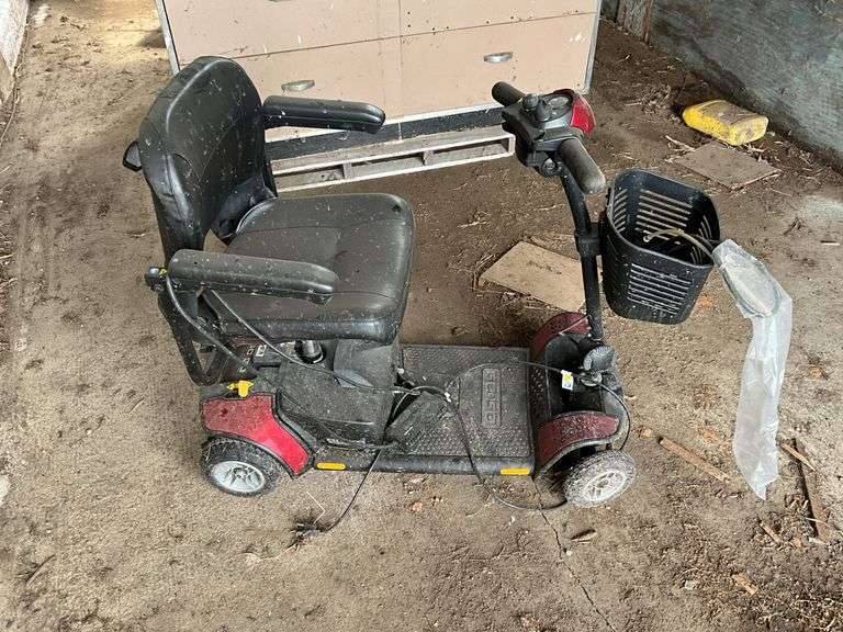 Go-Go electric scooter, w/charger. Unknown condition
