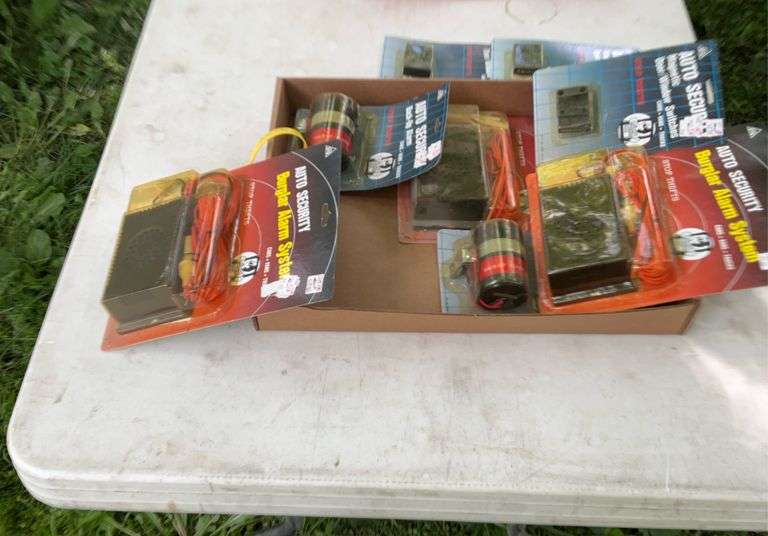 Flat of back up alarms, misc electrical