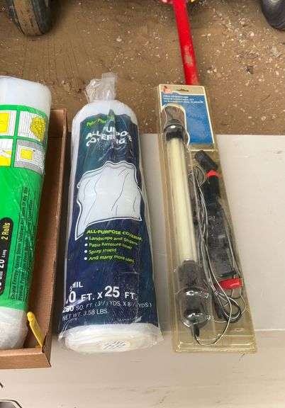 3 rolls of plastic and a work light
