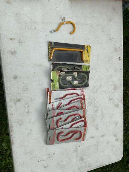 Flat of tool organizers, carabineers, storage hooks