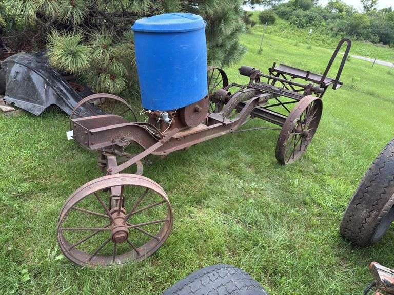 Steel wheeled cart(was once a saw rig) with Farm Master, Sears Roebuck and