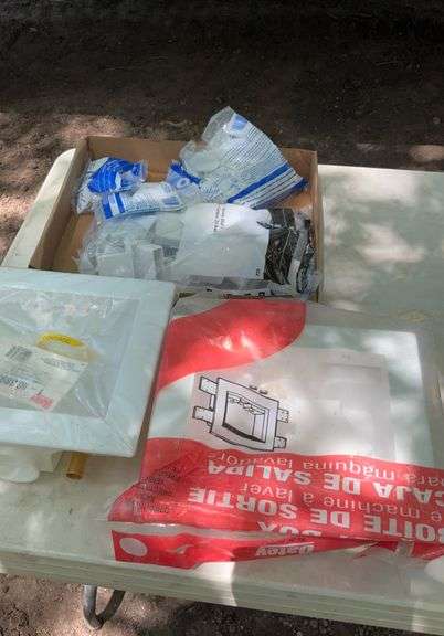Box of plumbing supplies