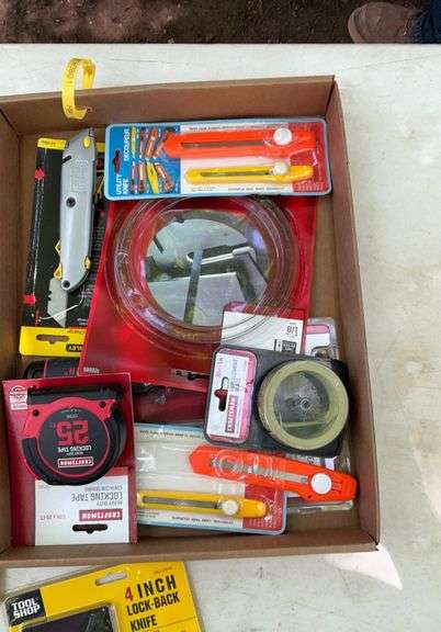 Flat of utility knives, band saw blades, tape measure replacement