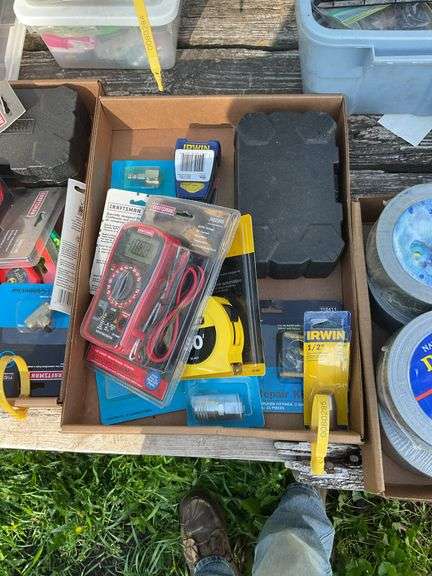 Flat of multi-meter, craftsman bit set, tape measure, misc connectors