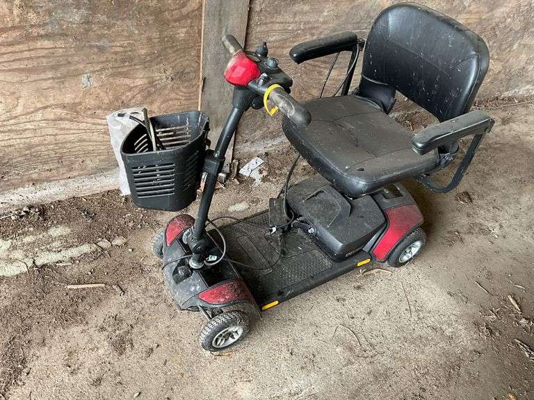 Go-Go electric scooter, w/charger. Unknown condition