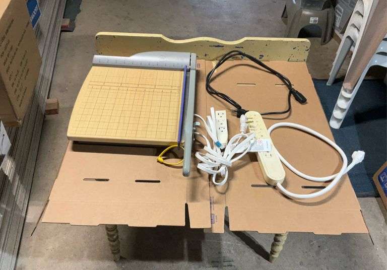 Paper cutter and power strip