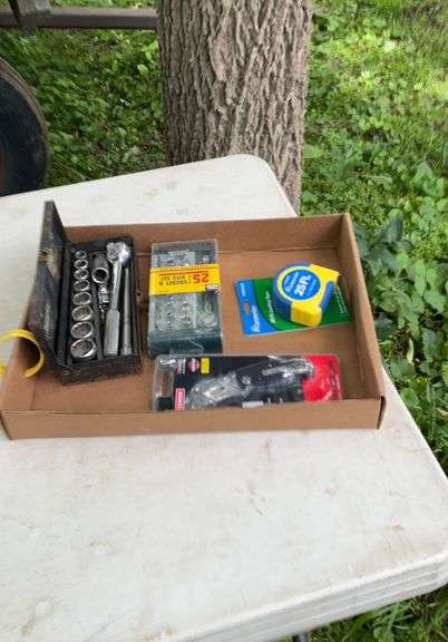 3/8, 1/4 socket set, utility knife, tape measure