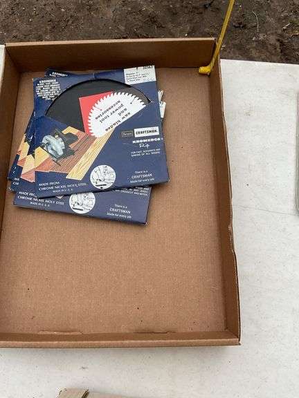 Flat of new & used saw blades
