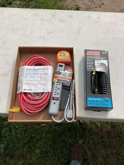 Flat of extension cords, power strips, air hose